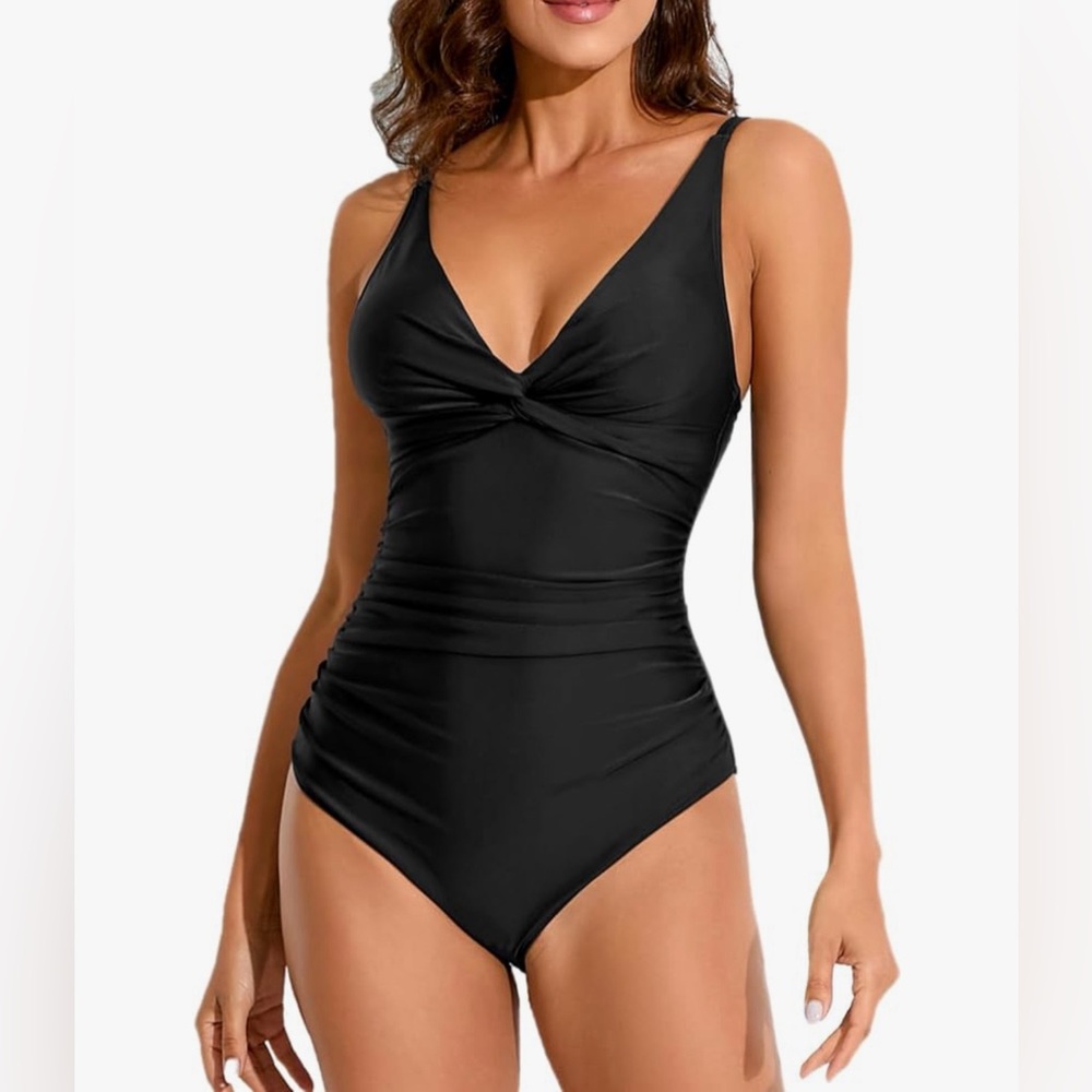 Black bath suit size large with tummy control